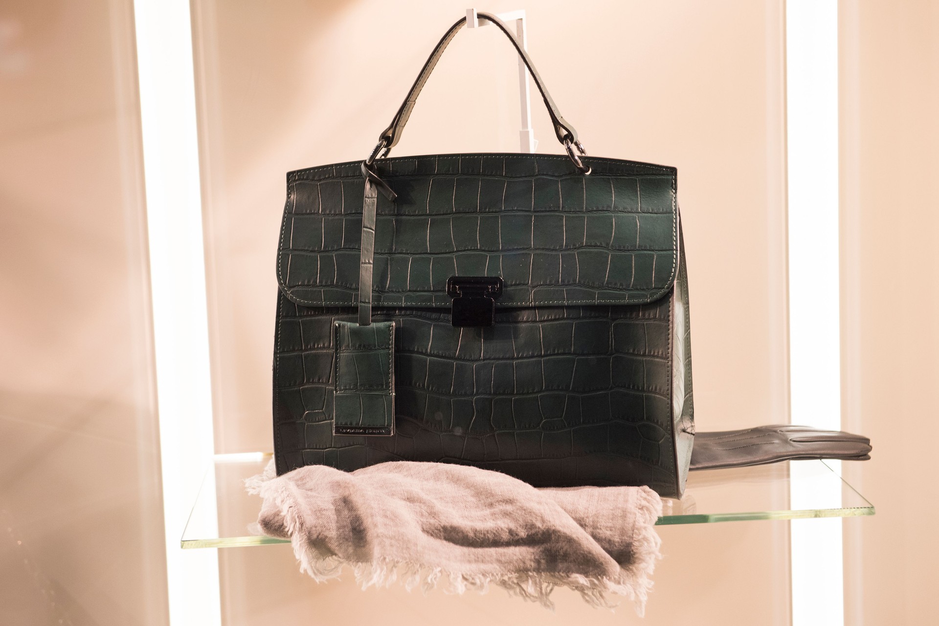 Women handbag in a luxury fashion shop in Milan, Italy.